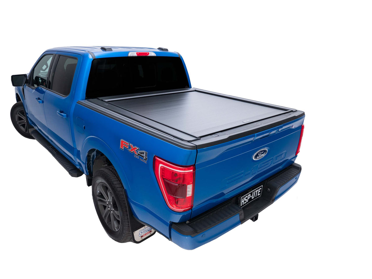 Ford F-150 with 5'5" tub fitted with roller shutter, offering secure and low-profile bed protection for work and recreation.