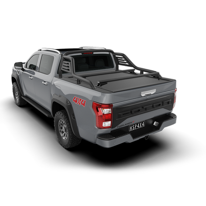 rear 2/4 view of a grey Foton Tunland ute with a closed HSP Electric Roller Cover, tub crossbars and a sports bar in a studio setting.