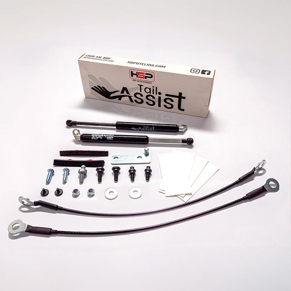 HSP Tail Assist kit components including struts, brackets, bolts and installation hardware laid out on white background