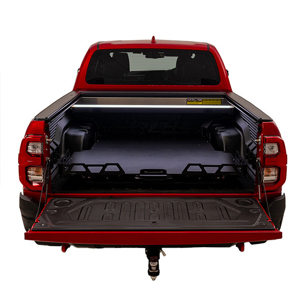 Red Toyota Hilux SR5 with HSP load slide tucked in, straight rear view