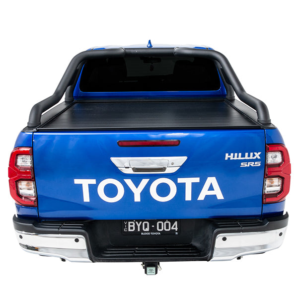 Blue Toyota Hilux SR5 with roll top and roller cover closed rear view