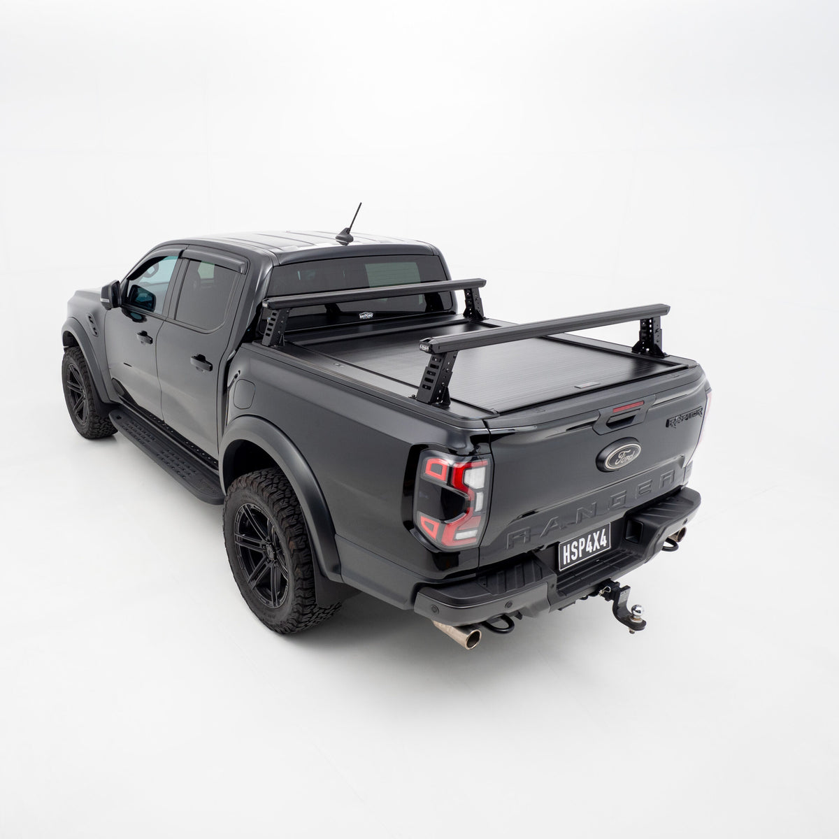 Tub rack fitted to Ford Ranger and Raptor, showcasing heavy-duty design for rooftop tents and accessories.