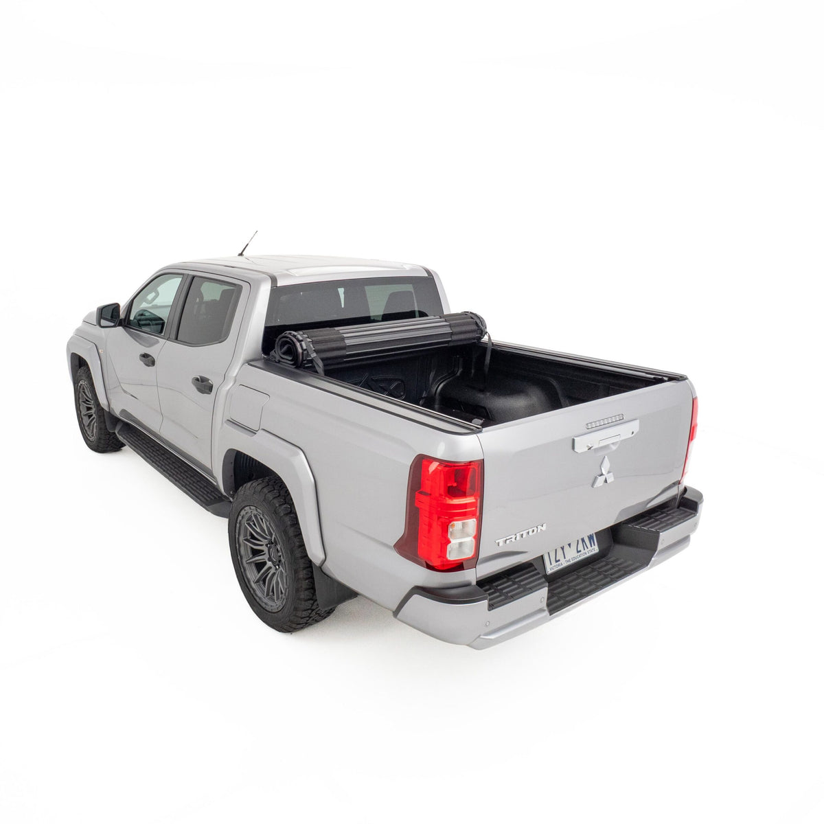 HSP Roll Mate manual roll-up cover open showing full tub access on Triton MV