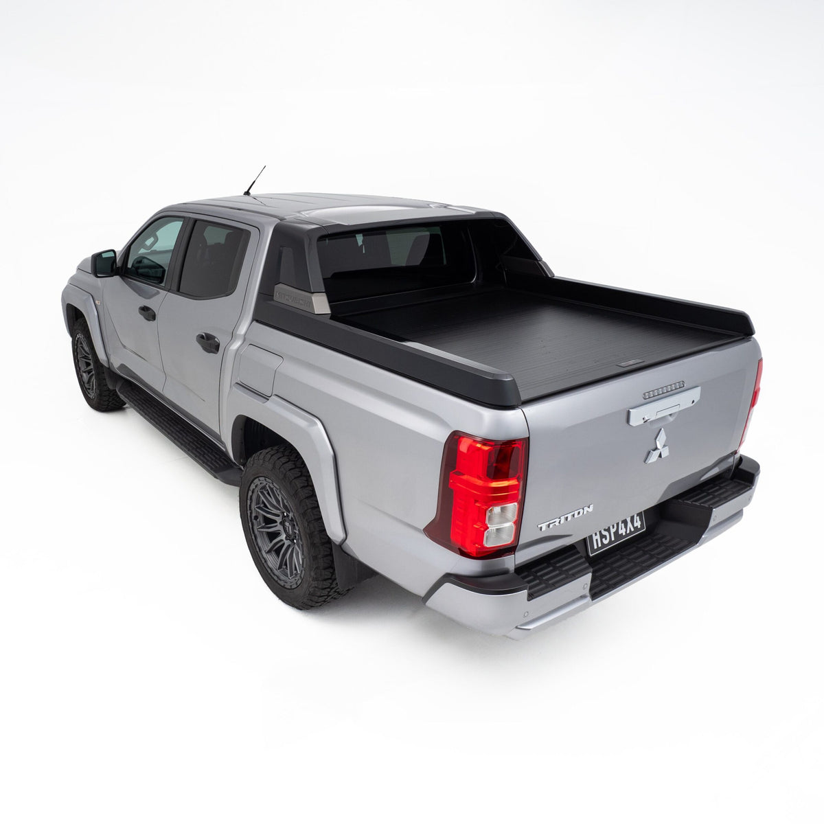 Mitsubishi Triton MV fitted with roller shutter, providing secure, low-profile tub cover suitable for trade and touring use.