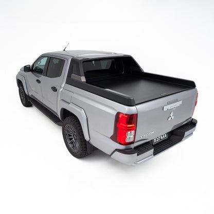 Mitsubishi Triton MV fitted with roller shutter, providing secure, low-profile tub cover suitable for trade and touring use.