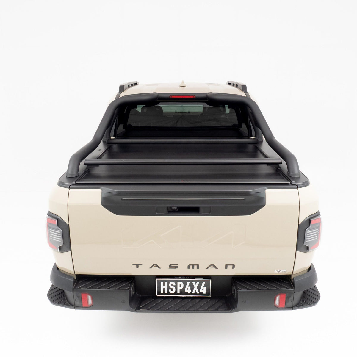 Rear view of a Kia Tasman ute with HSP Load Bars fitted to a HSP RollR cover.