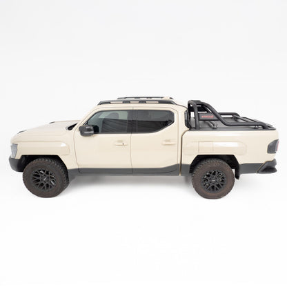 Side view of a cream Kia Tasman dual cab ute fitted with HSP Load Bars mounted to a Roll R roller cover, shown on a white background.